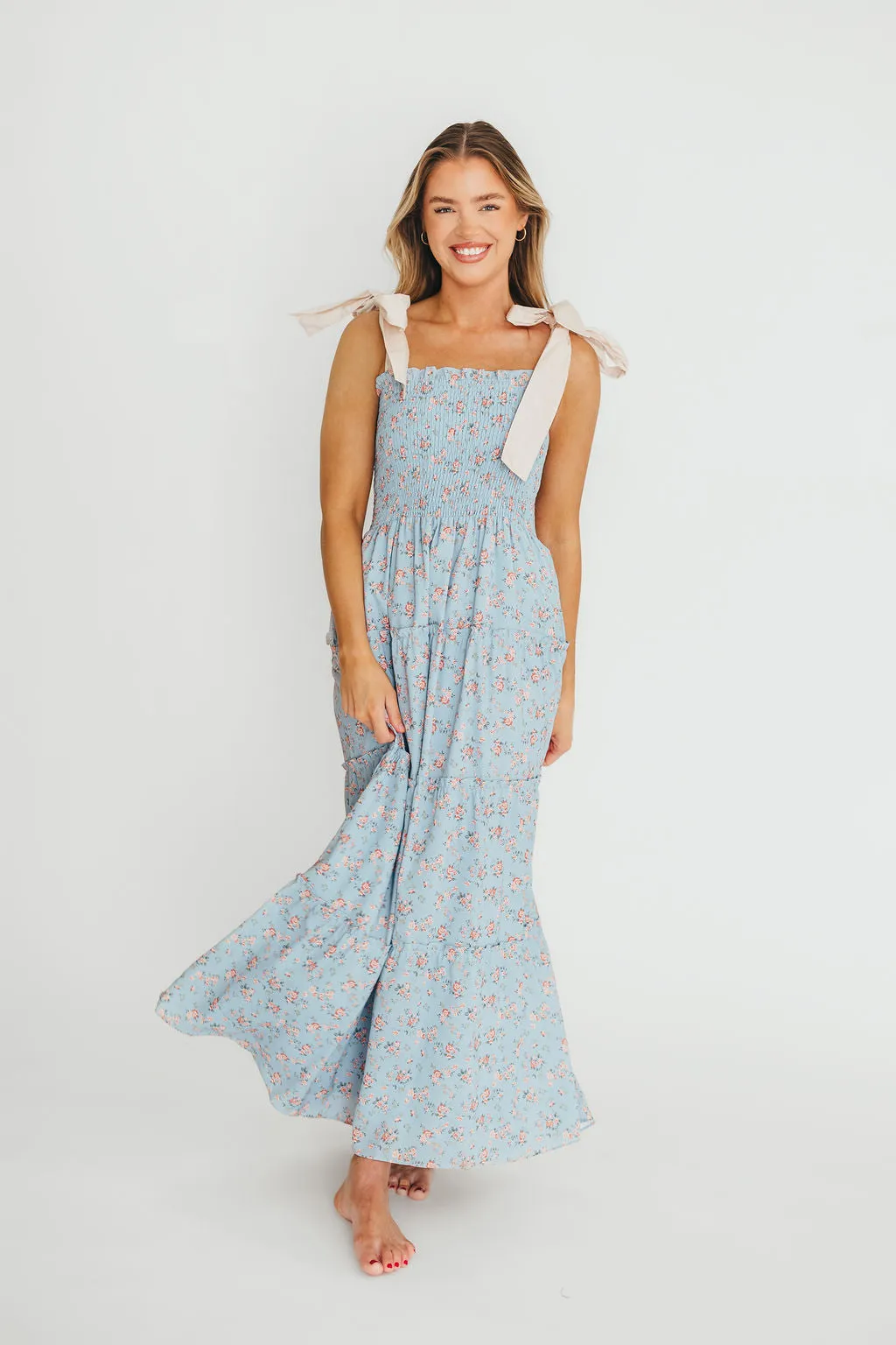 Cora Smocked Bow Tie Strap Maxi Dress in Blue sold by Worth Collective product image thumbnail 2