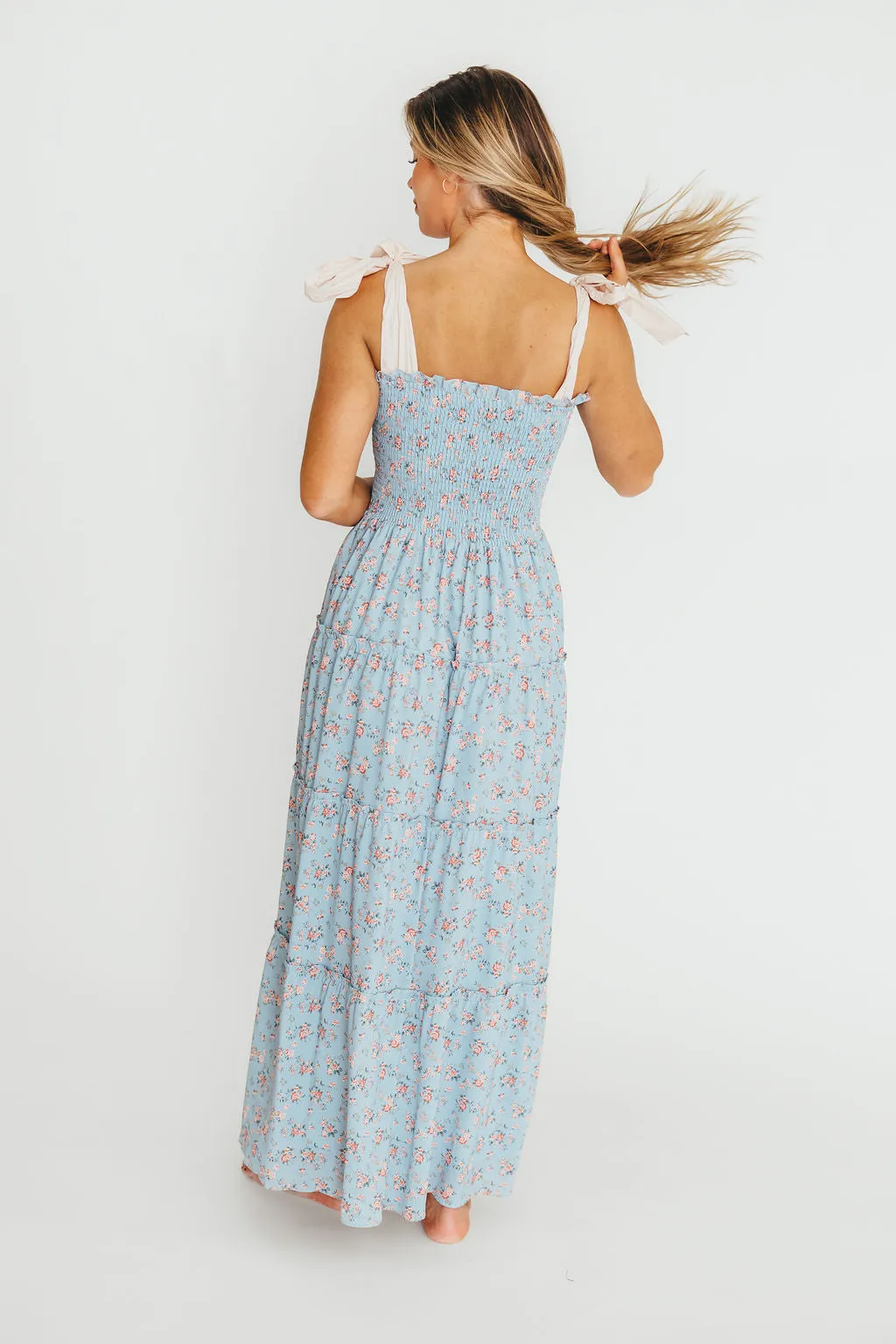 Cora Smocked Bow Tie Strap Maxi Dress in Blue sold by Worth Collective product image thumbnail 5