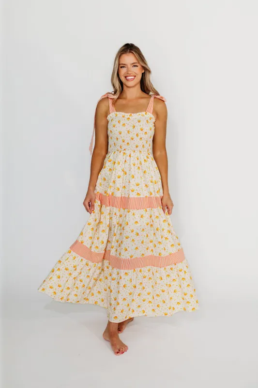 Vida Floral Maxi Dress in White/Orange sold by Worth Collective