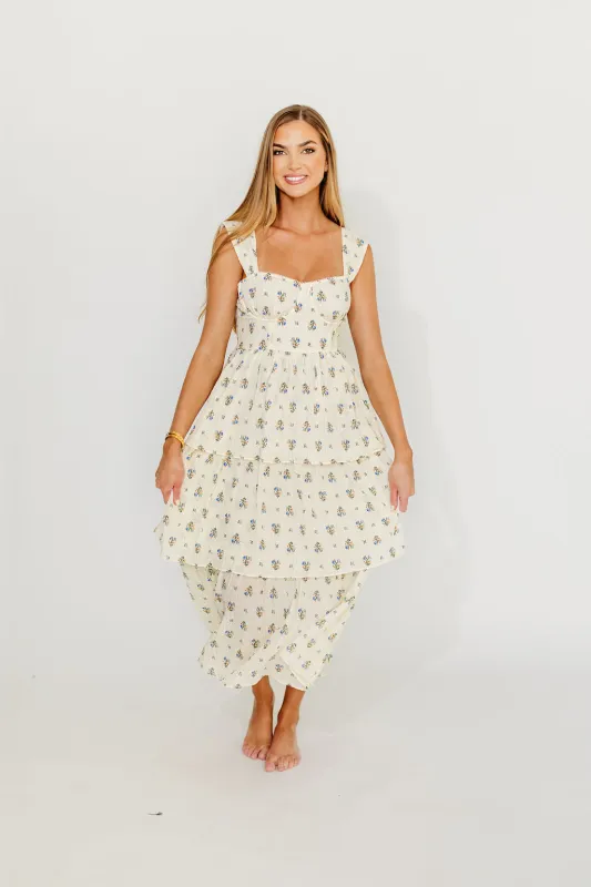 Marjorie Bustier Ruffle Layered Maxi Dress in Cream/Blue Floral sold by Worth Collective