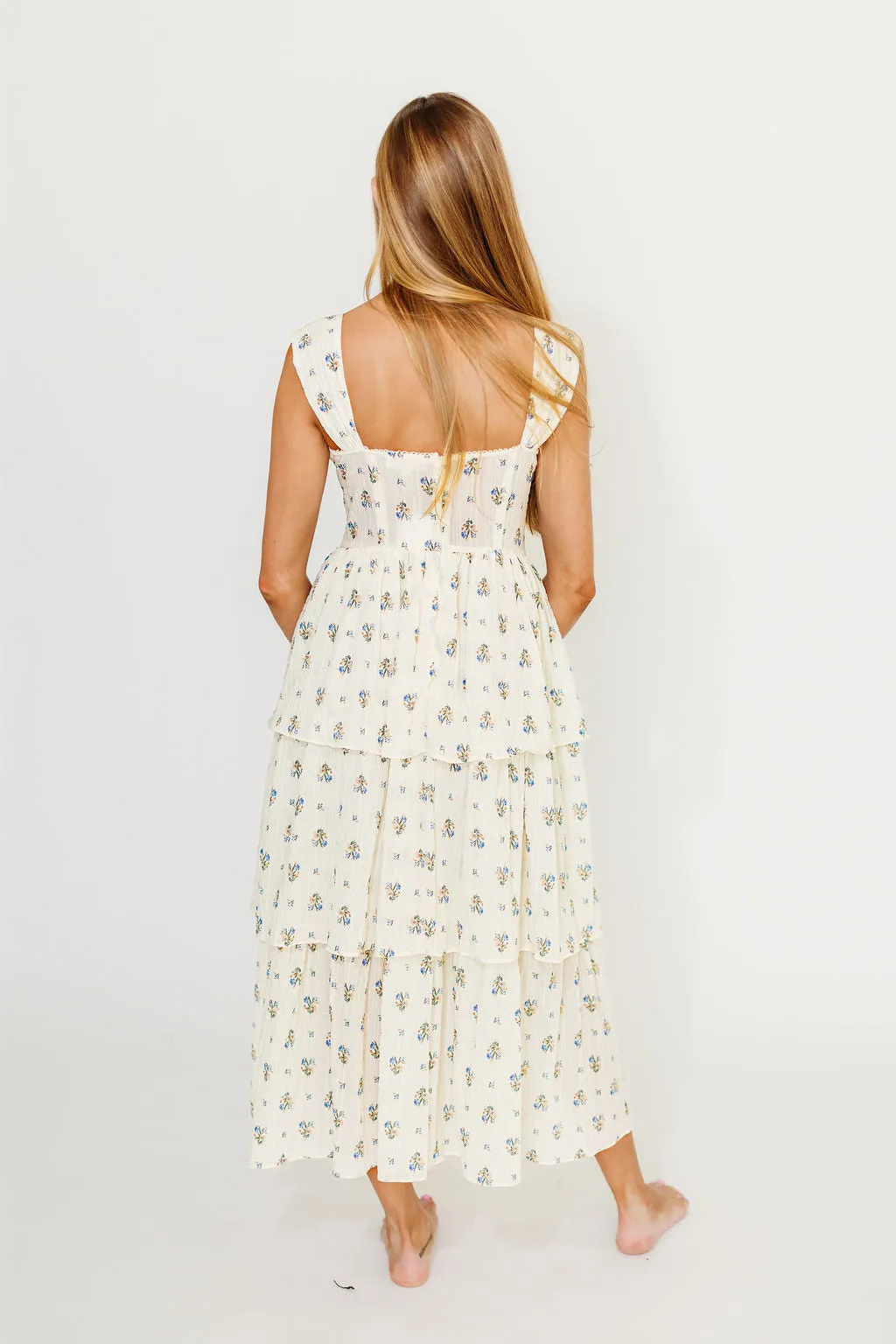 Marjorie Bustier Ruffle Layered Maxi Dress in Cream/Blue Floral sold by Worth Collective product image thumbnail 4