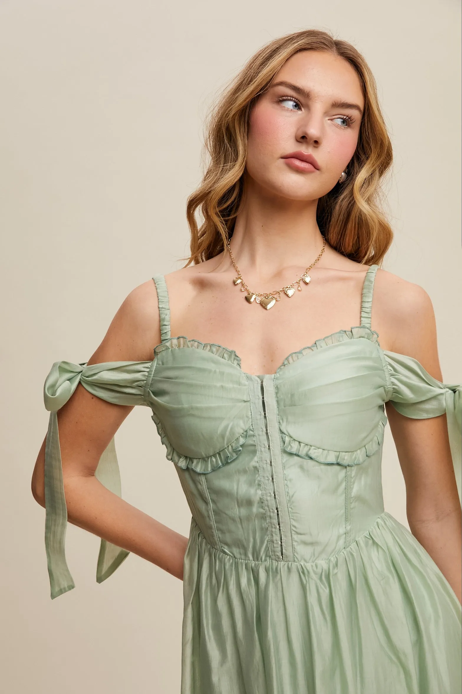 Paulina Sleeveless Sweetheart Midi Dress in Light Sage sold by Worth Collective product image thumbnail 5