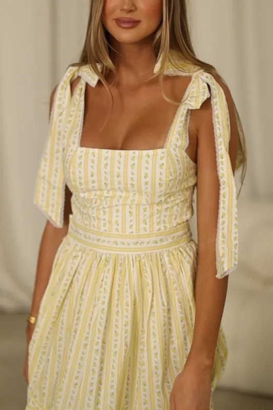Garcelle Wallpaper Floral Tiered Midi Dress in Yellow sold by Worth Collective