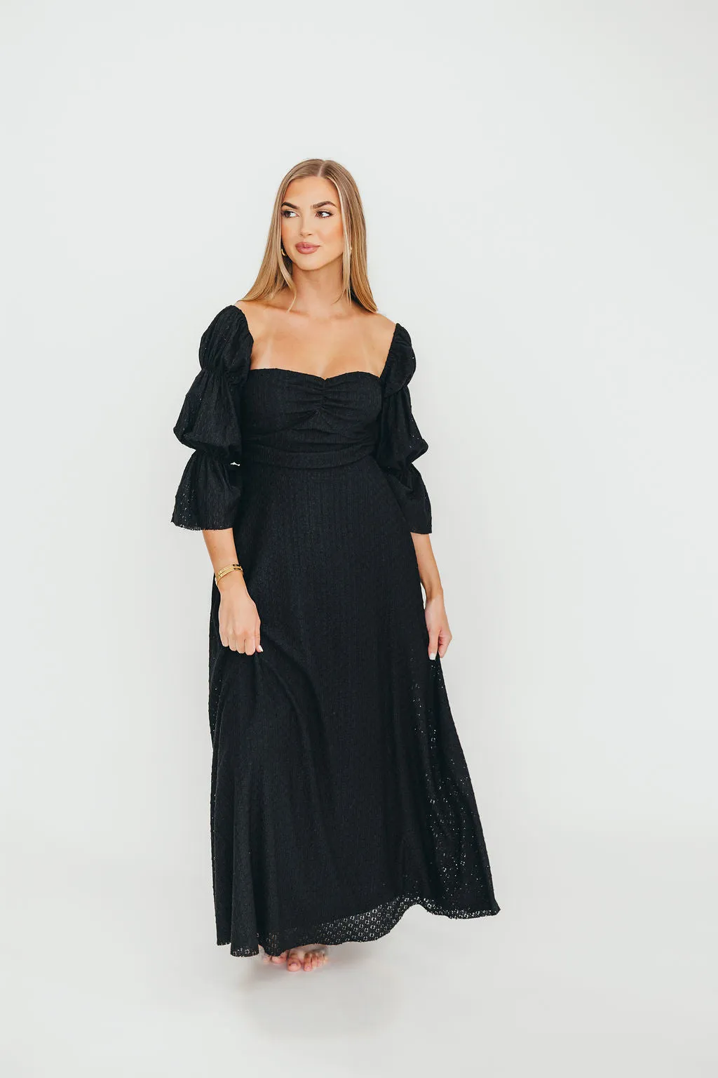 Corrine Tiered Sleeve Maxi Dress with Pockets in Black - Bump Friendly sold by Worth Collective