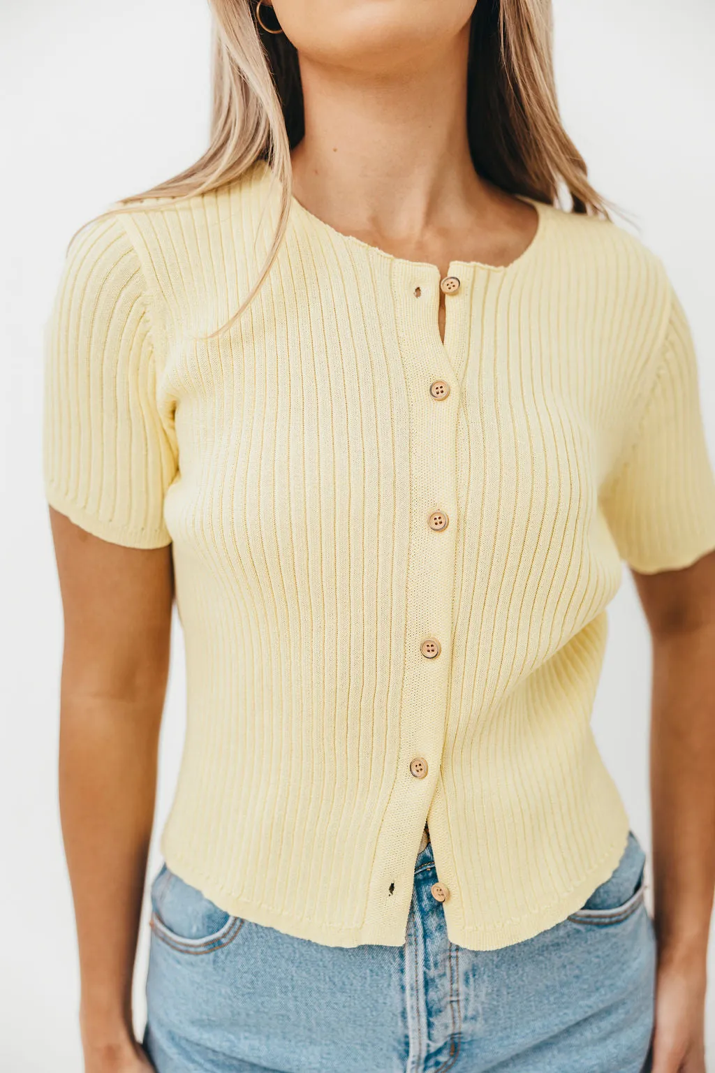 Meg Raw Edge Button Up Ribbed Knit Top in Light Yellow sold by Worth Collective