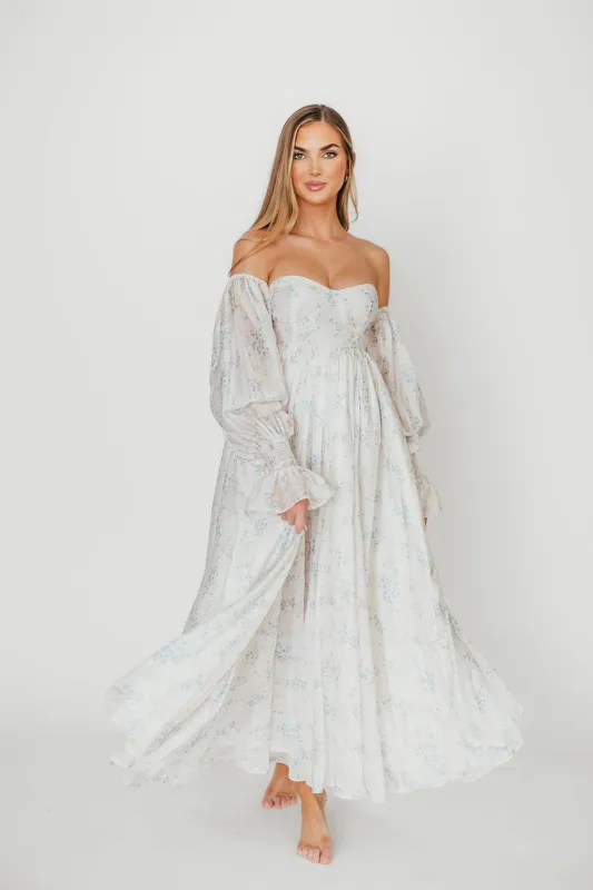 Dear Skye Floral Dress in Blue sold by Worth Collective