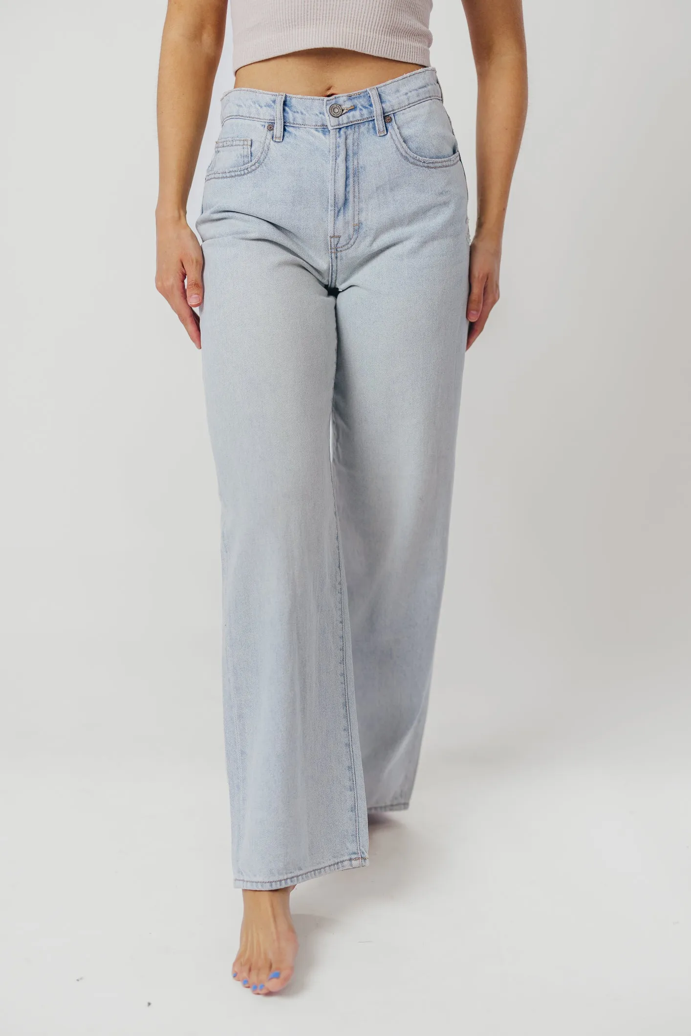 Nori Lightly Distressed Stretch Denim in Light Wash sold by Worth Collective product image thumbnail 5