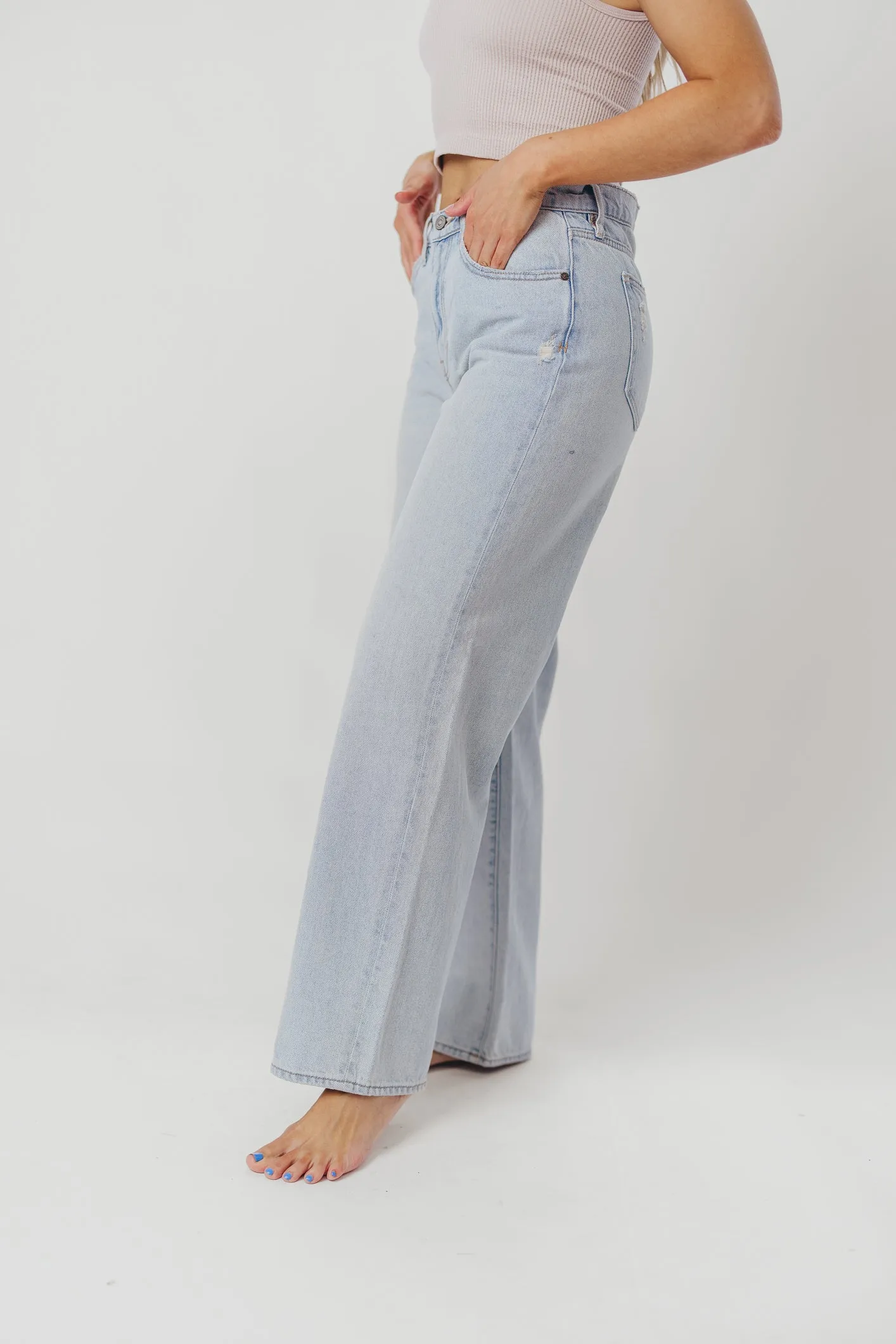 Nori Lightly Distressed Stretch Denim in Light Wash sold by Worth Collective product image thumbnail 3