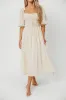 Darling Midi Dress in Cream sold by Worth Collective