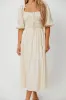 Darling Midi Dress in Cream sold by Worth Collective