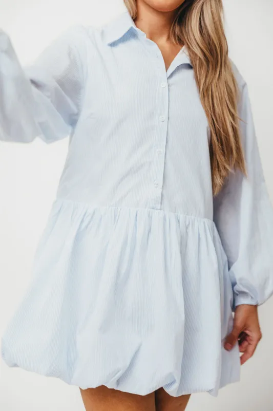 Kyle Bubble Hem Mini Shirt Dress in Sky sold by Worth Collective