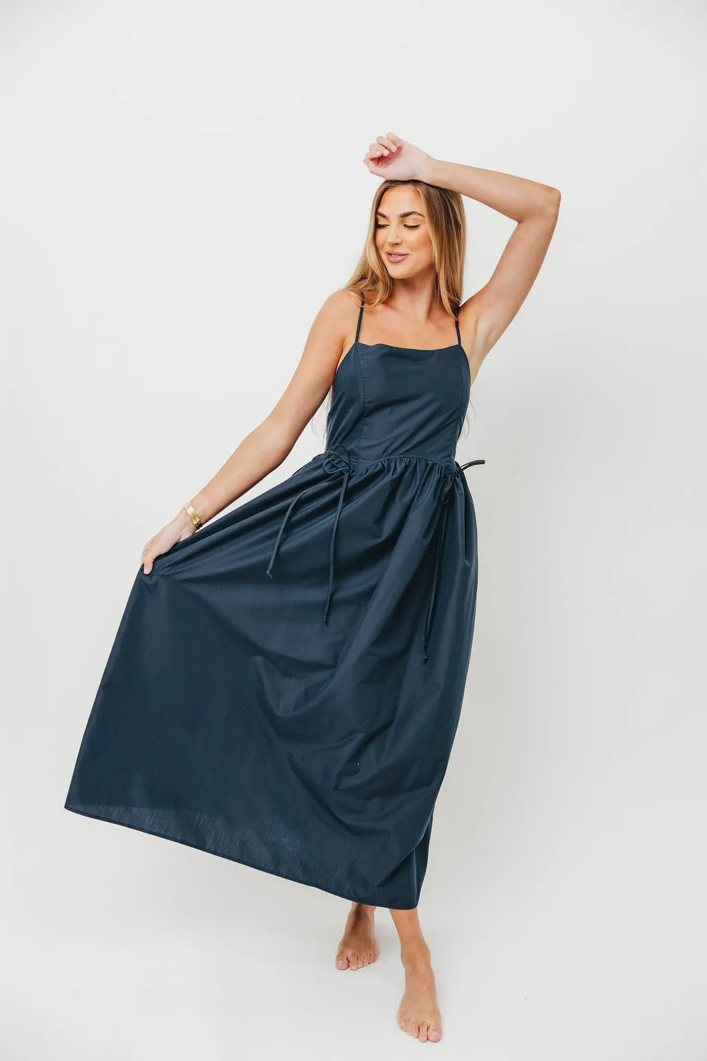 Gracelyn Bow Tie Front Detail Maxi Dress in Navy sold by Worth Collective