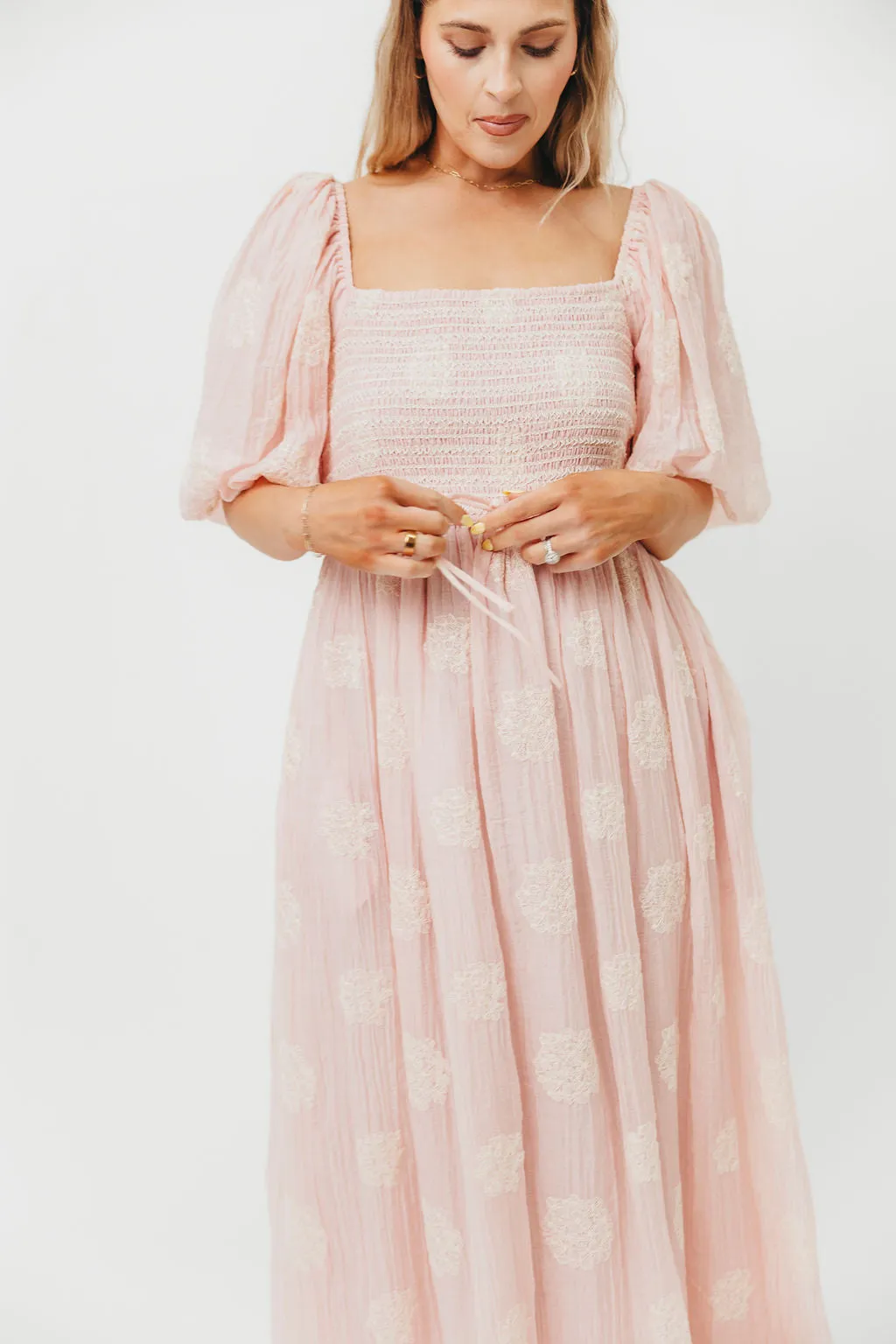 Aimee Smocked Embroidered Floral Midi Dress in Blush sold by Worth Collective product image thumbnail 5