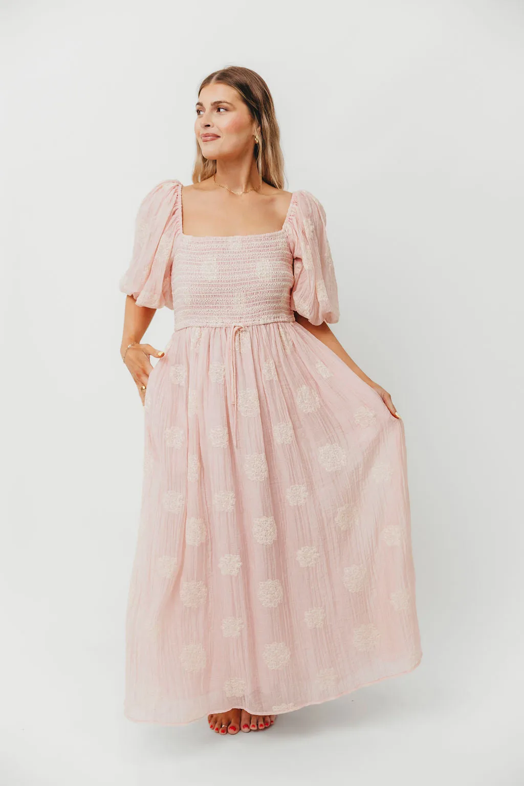 Aimee Smocked Embroidered Floral Midi Dress in Blush sold by Worth Collective product image thumbnail 4