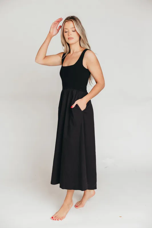 Lucinda Maxi Dress in Black sold by Worth Collective