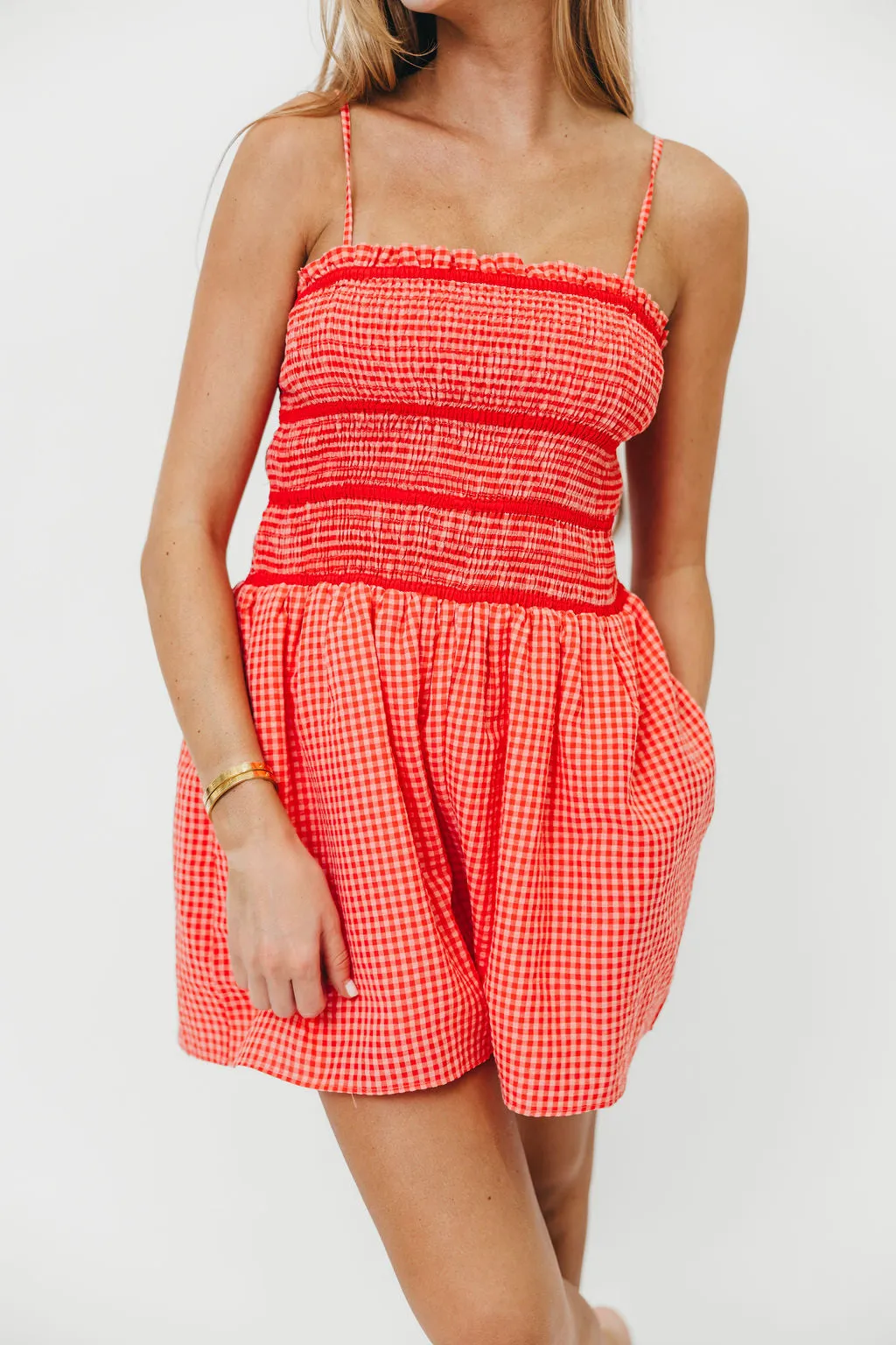 Posey Gingham Romper in Pink/Red sold by Worth Collective