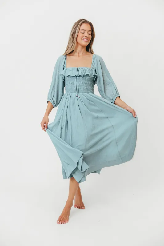Miffy Ruffled Smocking Flowy Midi Dress in Mint sold by Worth Collective