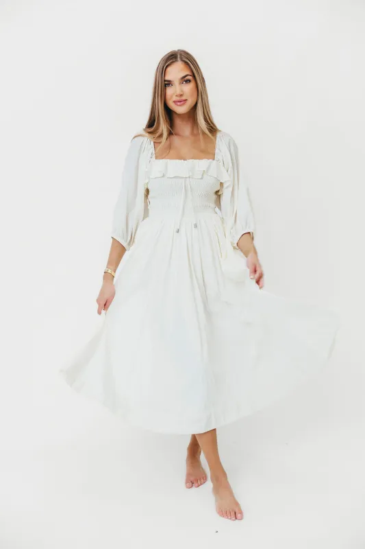 Miffy Ruffled Smocking Flowy Midi Dress in Ivory sold by Worth Collective