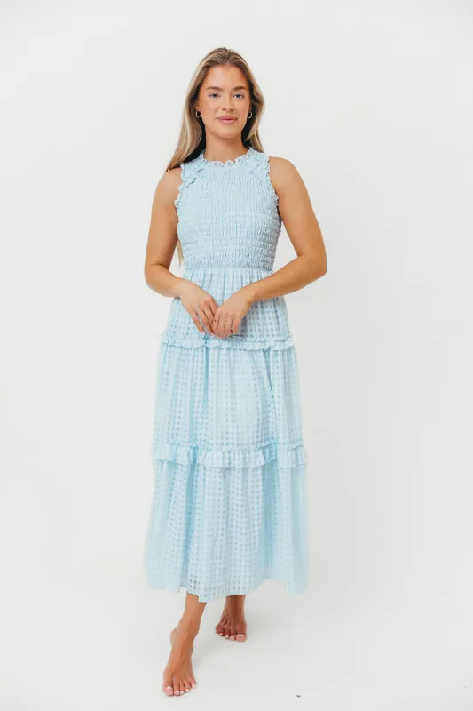 Hyacinth Sleeveless Gingham Maxi Dress With Ruffle Details in Powder Blue sold by Worth Collective