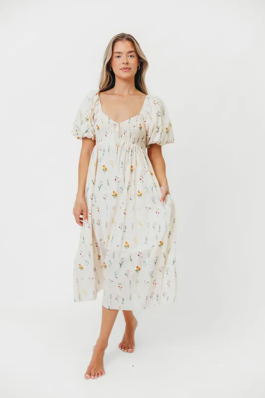 Magnolia Smocked Midi Dress with Tie in Floral sold by Worth Collective