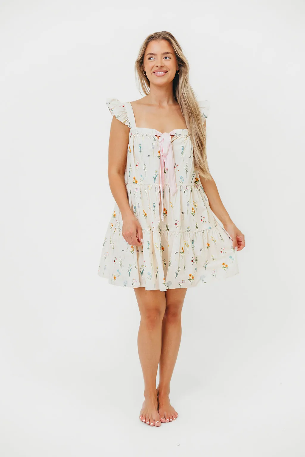 Lulu Flutter Sleeve Mini Dress in Floral sold by Worth Collective product image thumbnail 5