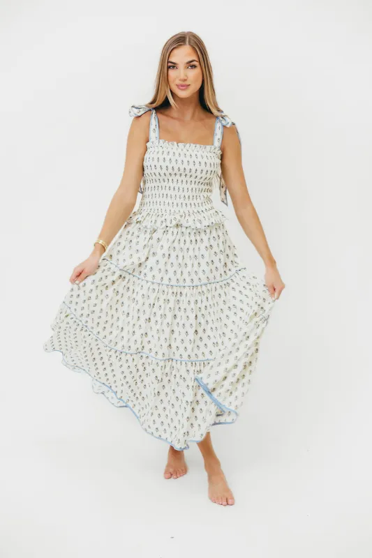 Calypso Floral Print Smocked Bodice Tiered Midi Dress in Cream sold by Worth Collective