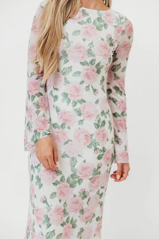 Leeland Floral Print Bell Sleeve Maxi Dress in Light Pink sold by Worth Collective