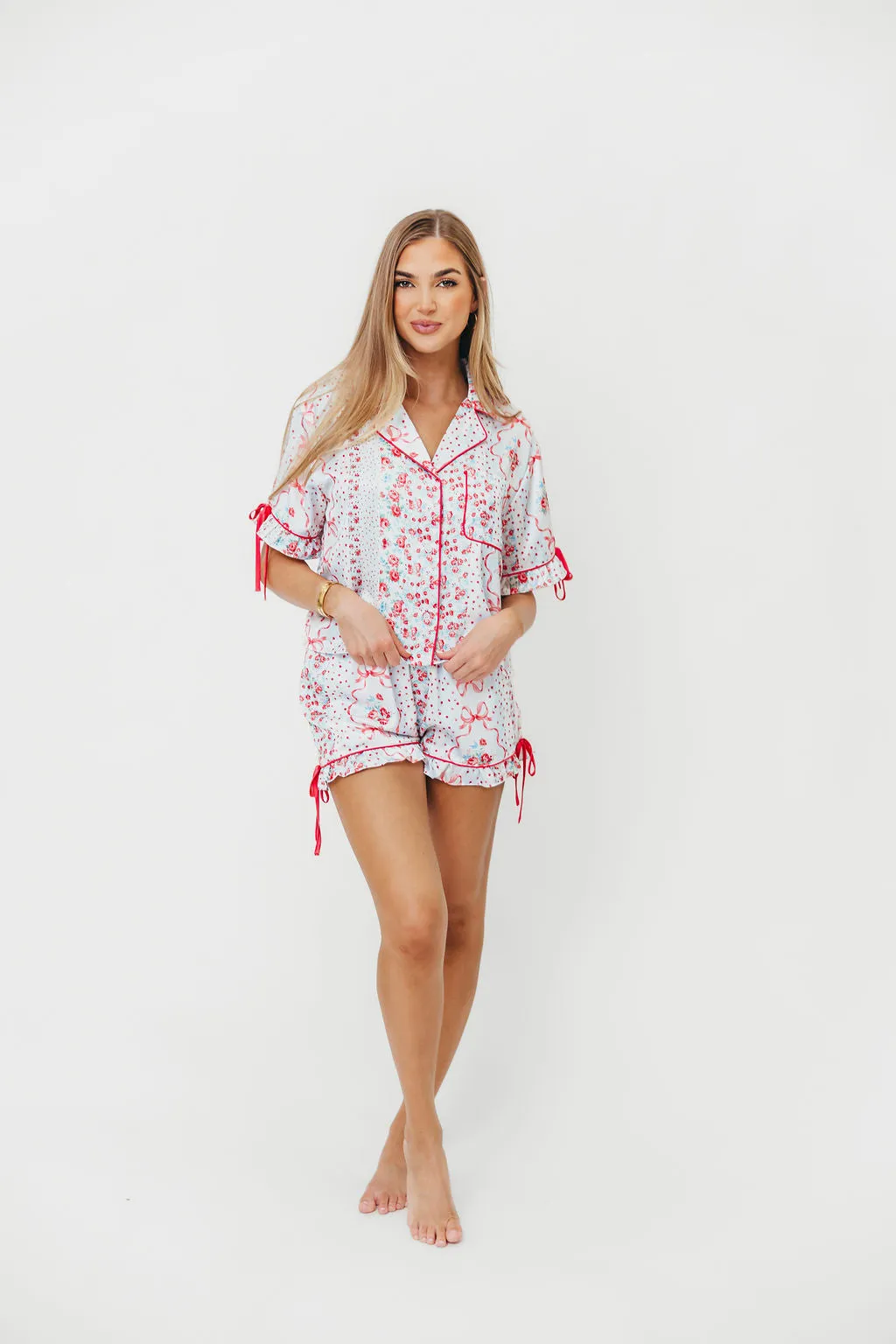 Rosalinda Floral Satin Ruffle Sleeve with Tie Detail P*Final-Sale*j Set in Light Blue/Multi sold by Worth Collective