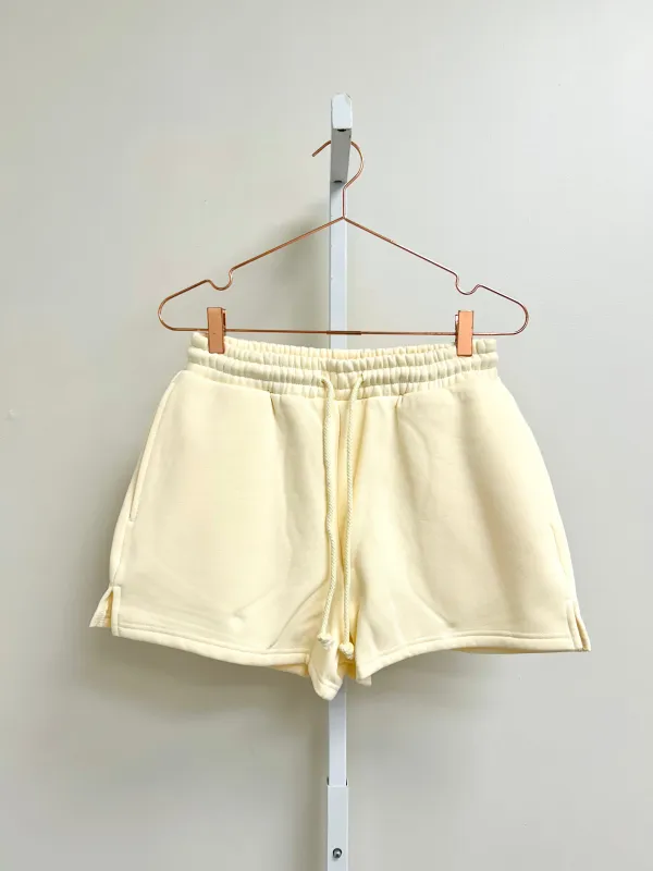 Basic Blank Sweat Shorts in Toasted Cream sold by Worth Collective