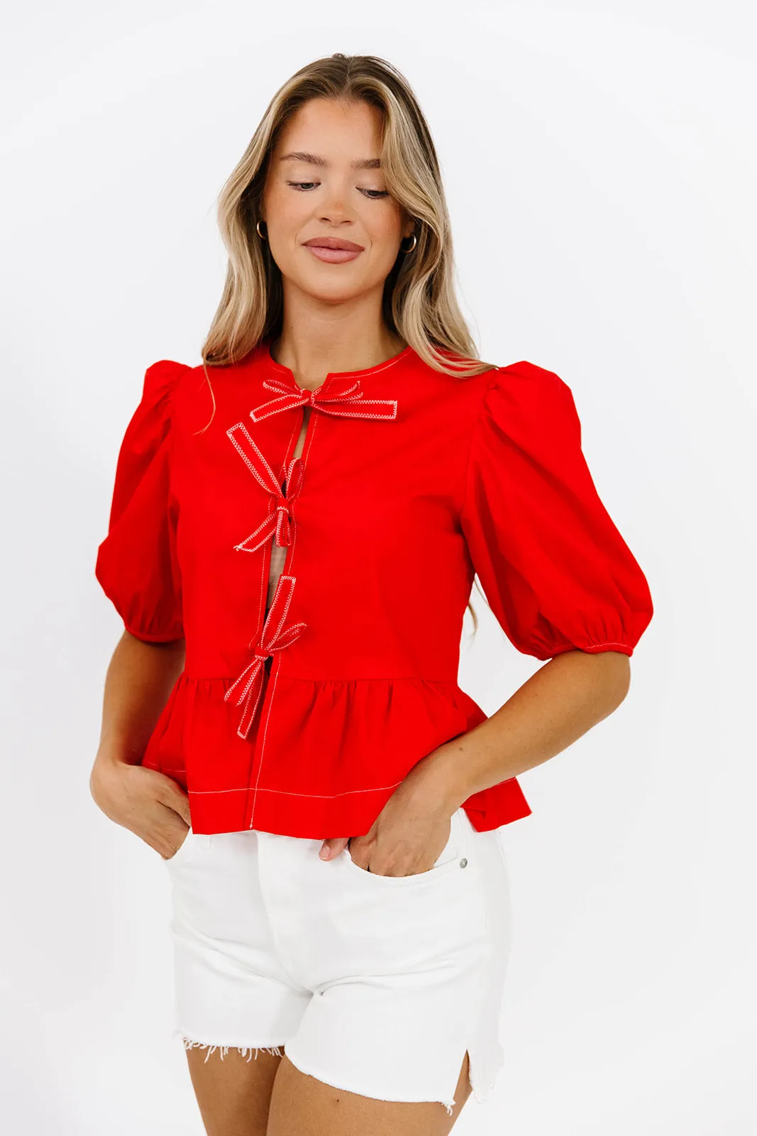 Mabel Knot Detail Peplum Top in Poppy sold by Worth Collective product image thumbnail 2