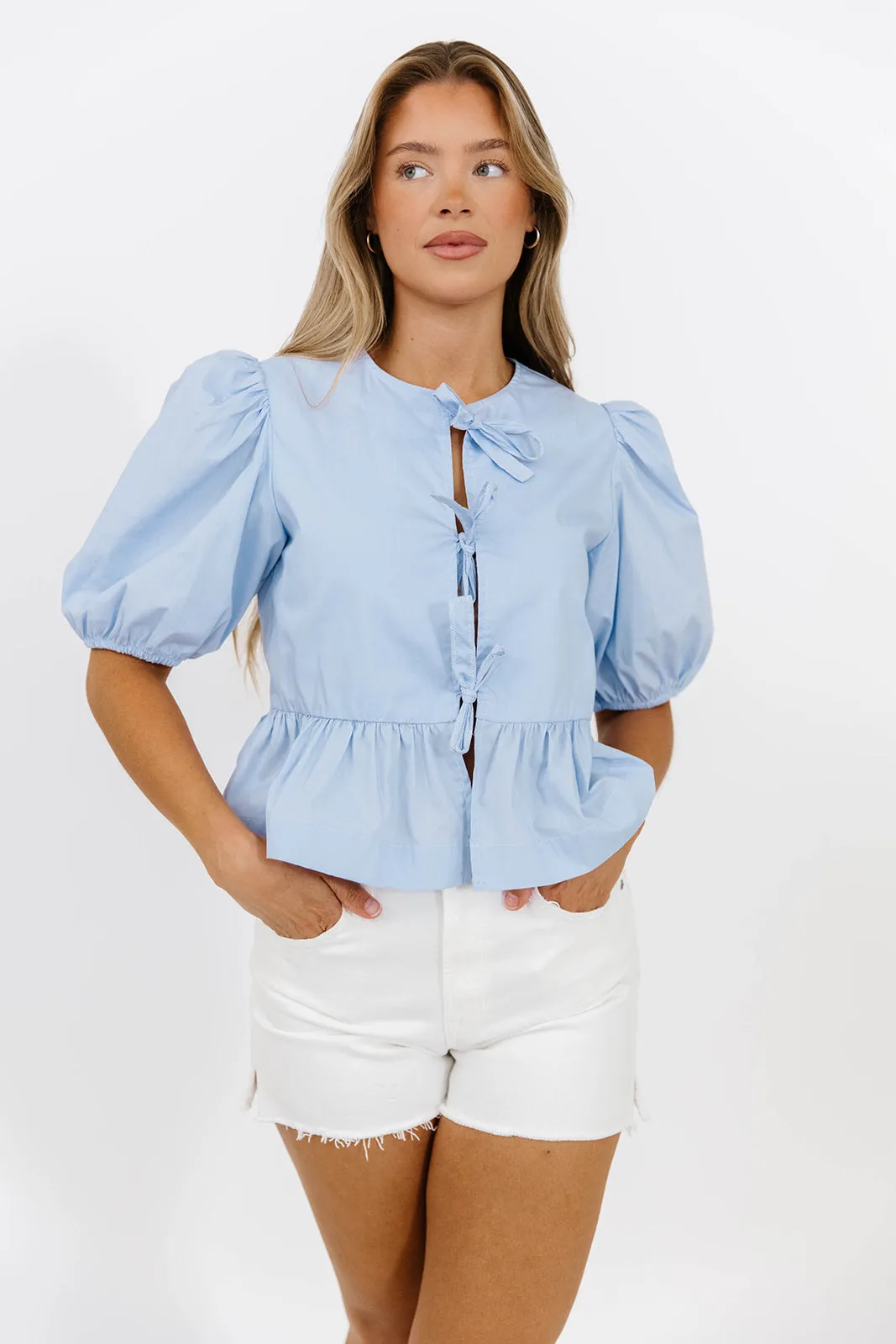 Mabel Knot Detail Peplum Top in Blue *Final-Sale* sold by Worth Collective