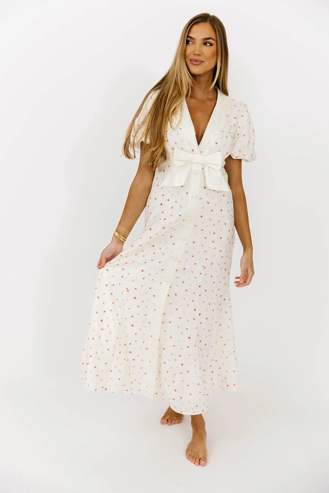 Florian Puff Sleeve Bow Front Collar Midi Dress in Cream sold by Worth Collective