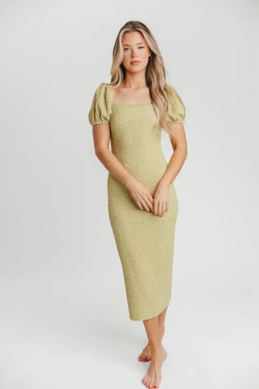 Mila Puffed Sleeve Midi Dress in Lime sold by Worth Collective