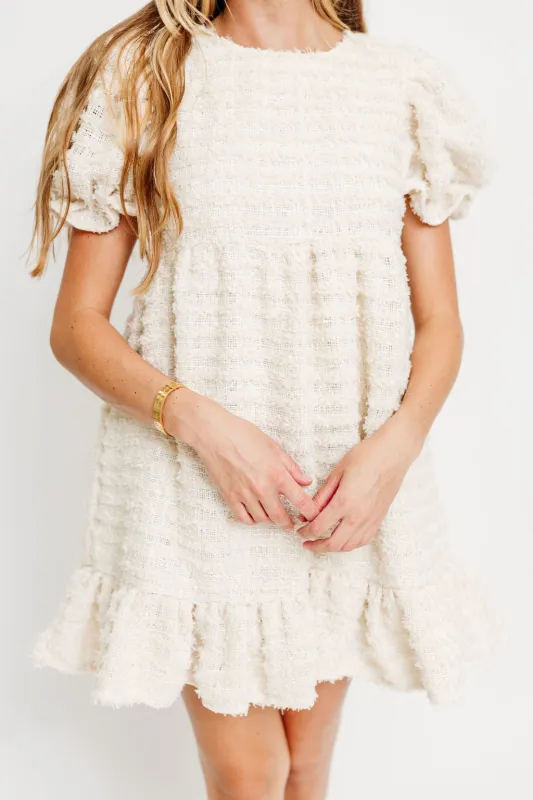 Blair Frayed Puff Sleeve Mini Dress in Cream sold by Worth Collective