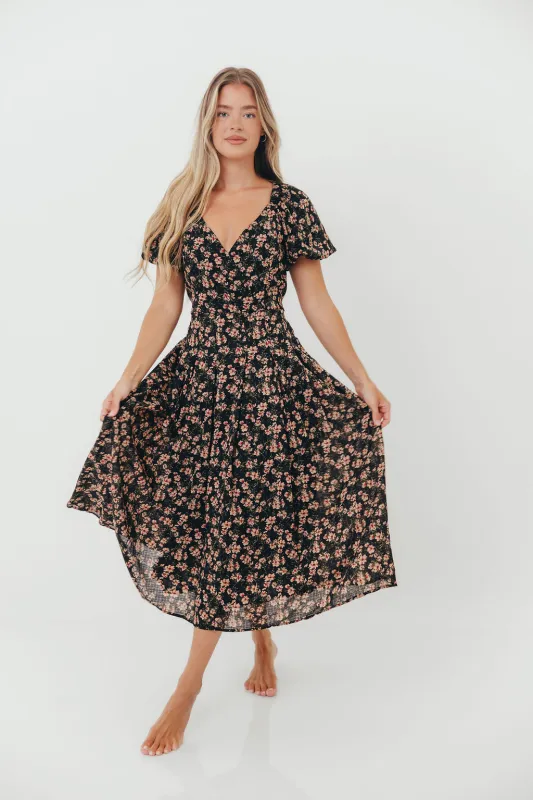 Milania Midi Dress in Black Floral sold by Worth Collective