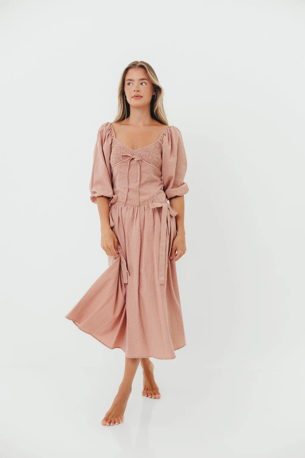 Marla Bow Detail Midi Dress in Dust Pink sold by Worth Collective