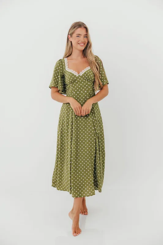 Mindy Flutter Sleeve Polka Dot Midi Dress in Olive sold by Worth Collective