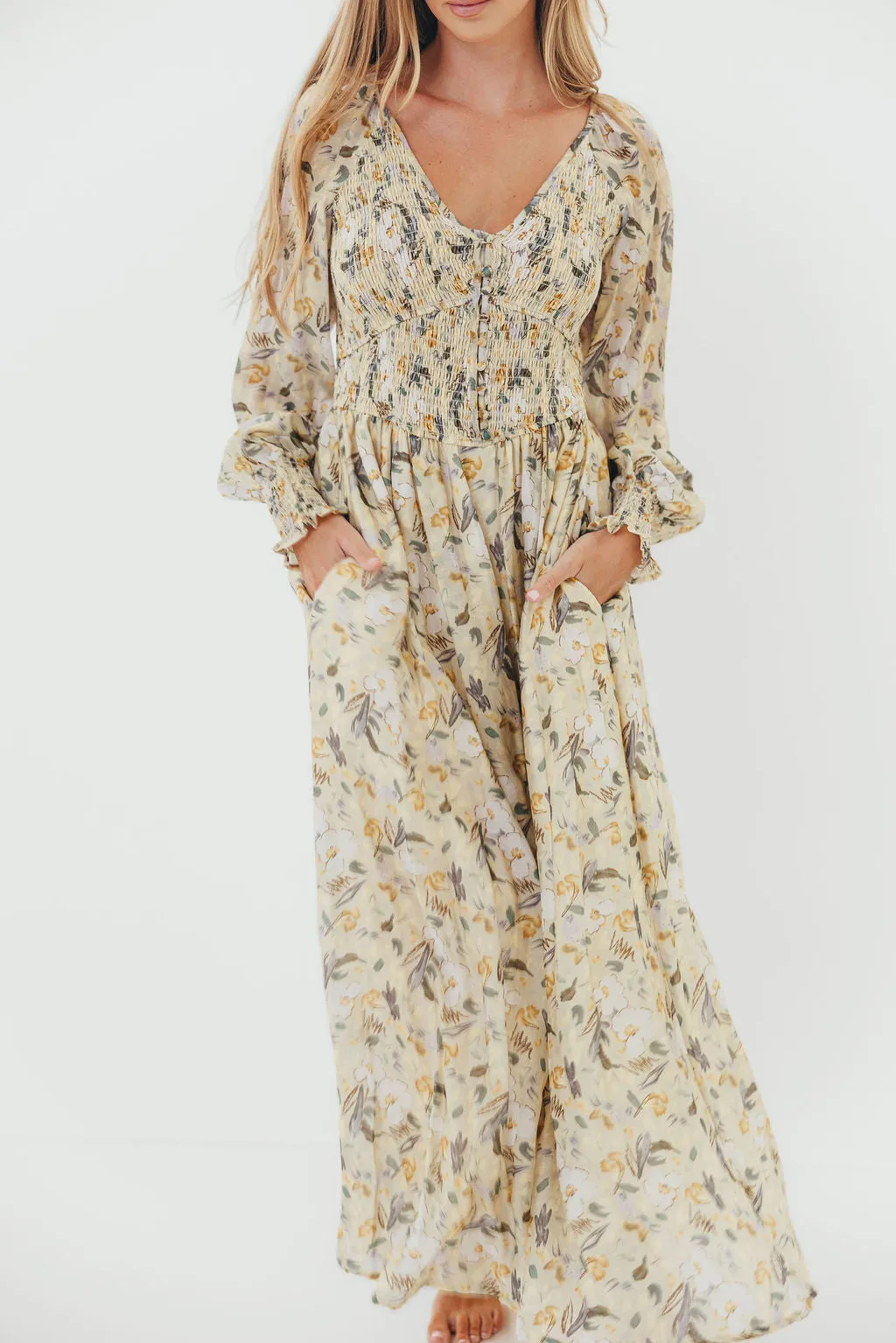 Luann Floral Maxi Dress in Vintage Cream sold by Worth Collective