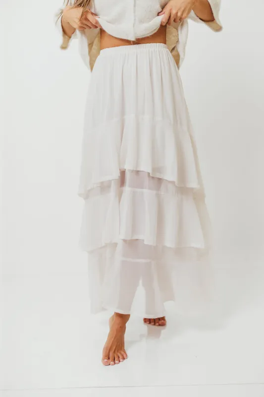 Talulah Ruffle Tiered Maxi Skirt in Ivory sold by Worth Collective