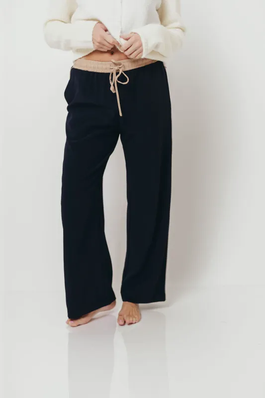 Amanza Vintage Contrast Piping Drawstring Pants in Navy Tan sold by Worth Collective