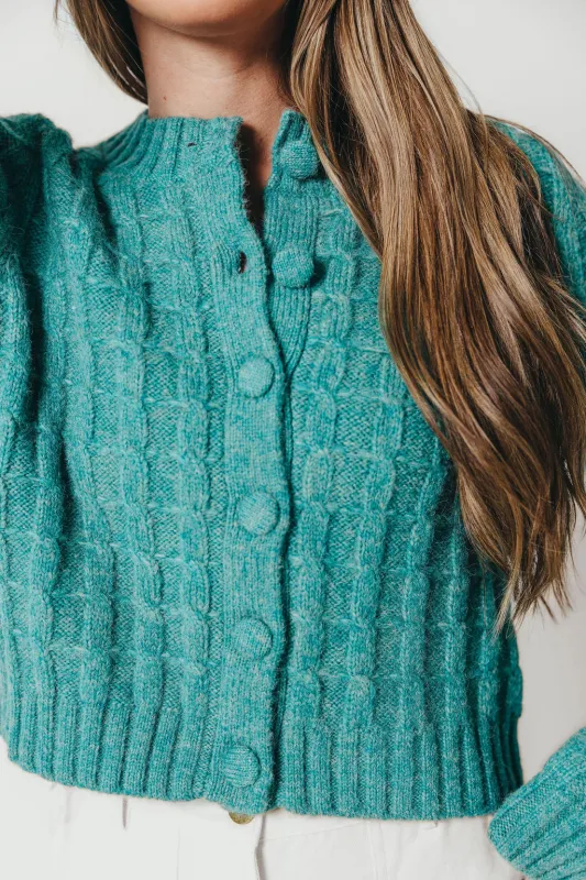 Adrienne Cable Knit Cardigan in Pine sold by Worth Collective