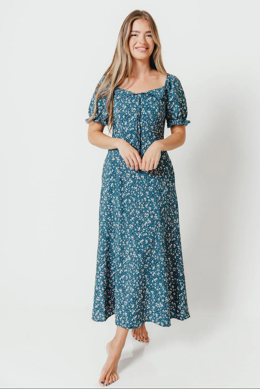 Betsy Floral Midi Dress in Blue/Cream sold by Worth Collective