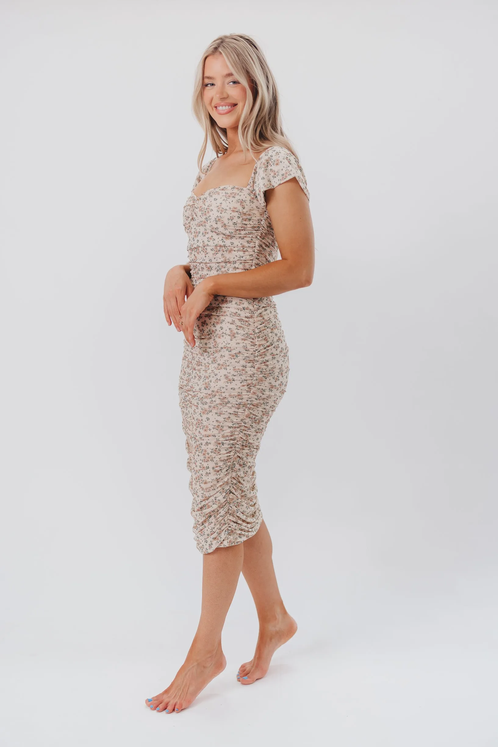 Lilliana Ruched Midi Dress in Vanilla Floral sold by Worth Collective product image thumbnail 4