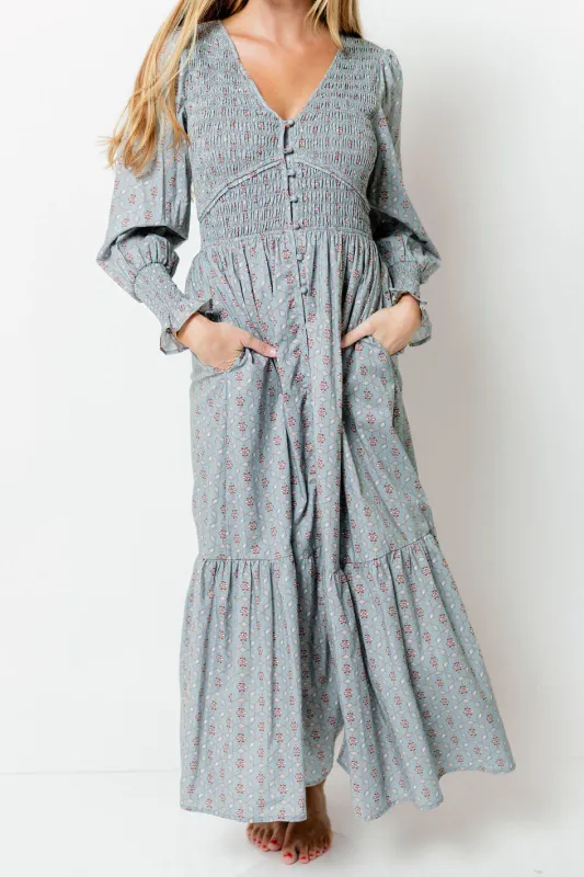Mercy Cotton Smocked Floral Button Down Maxi Dress in Slate Blue sold by Worth Collective