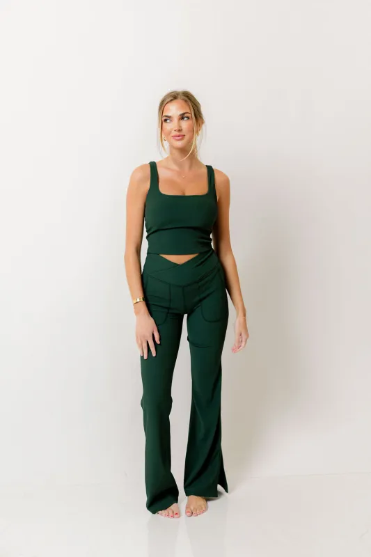 Mina Ribbed Crossover Waist Flared Leggings in Regency Green sold by Worth Collective