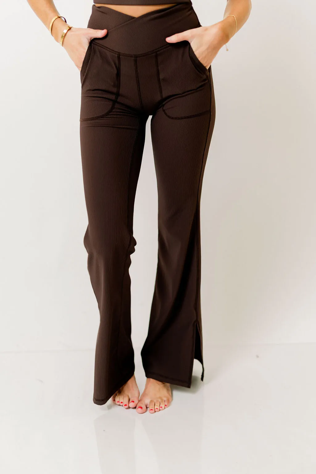 Mina Ribbed Crossover Waist Flared Leggings in Espresso sold by Worth Collective