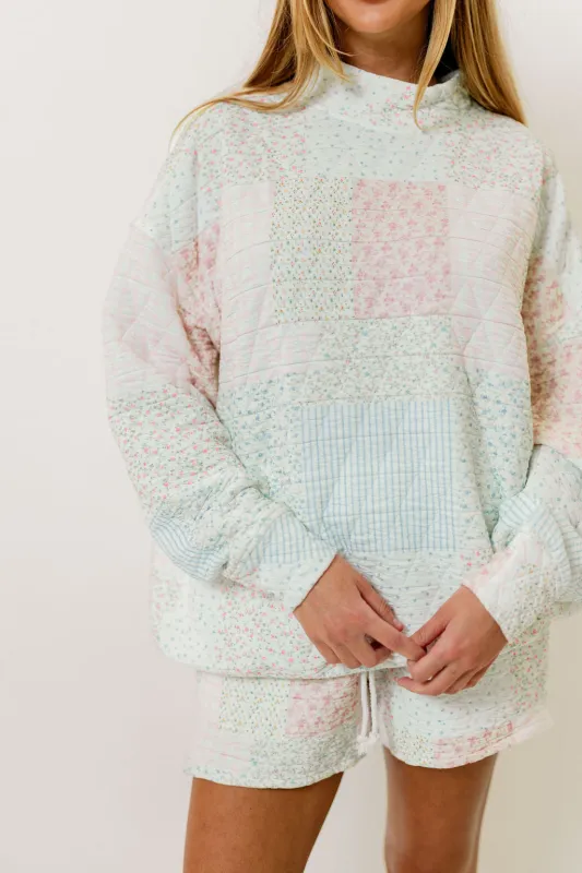 Sophia Quilted Mockneck Sweatshirt in Pastel sold by Worth Collective