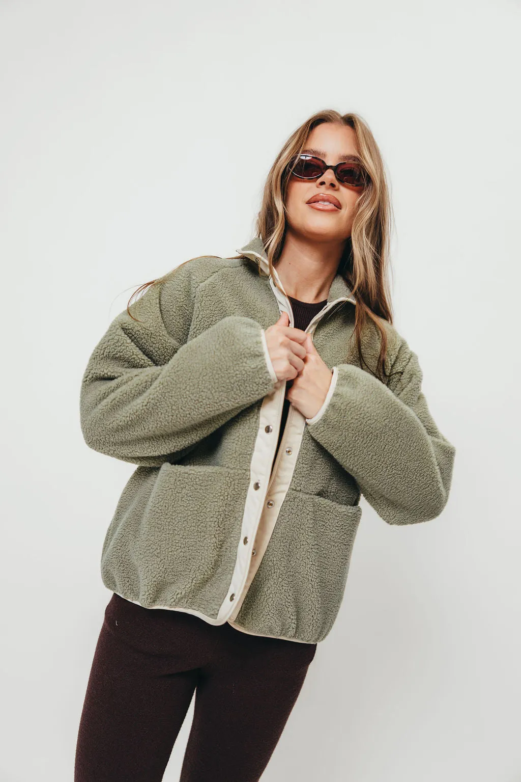 Arden Reversible Two Toned Sherpa Jacket in Mountain Sage sold by Worth Collective