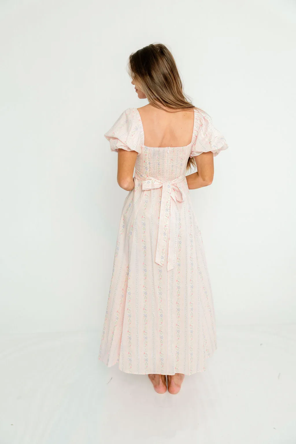 Tate Floral Print Puff Sleeve Midi Dress in Pink sold by Worth Collective product image thumbnail 4