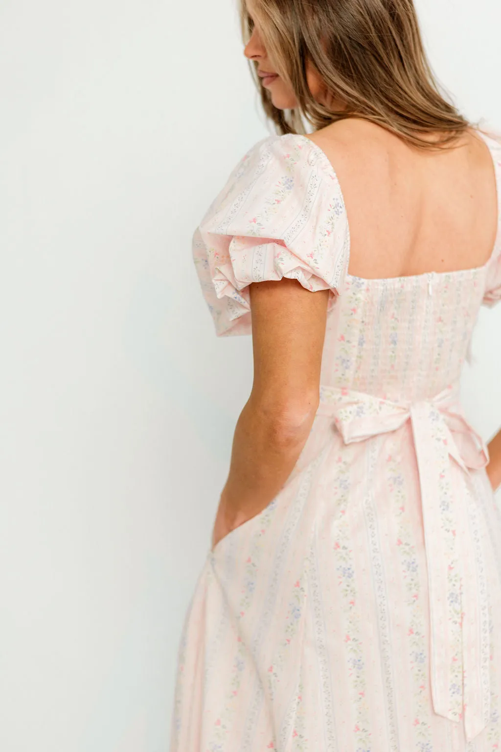 Tate Floral Print Puff Sleeve Midi Dress in Pink sold by Worth Collective product image thumbnail 5